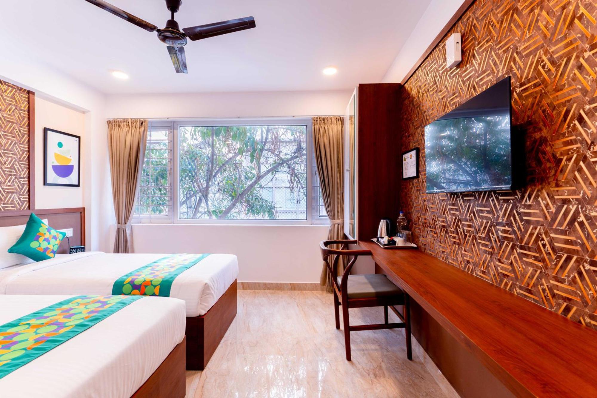 Treebo Emirates Suites Indiranagar Bangalore Bagian luar foto